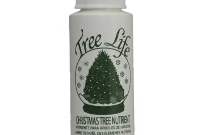 White, 2-oz bottle of Tree of Life Christmas Tree Nutrient with dark green text and image of Christmas tree