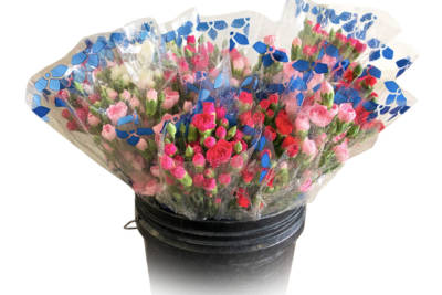 Red, pink, and white flower bouquets, wrapped in plastic and densely packed in a large black container